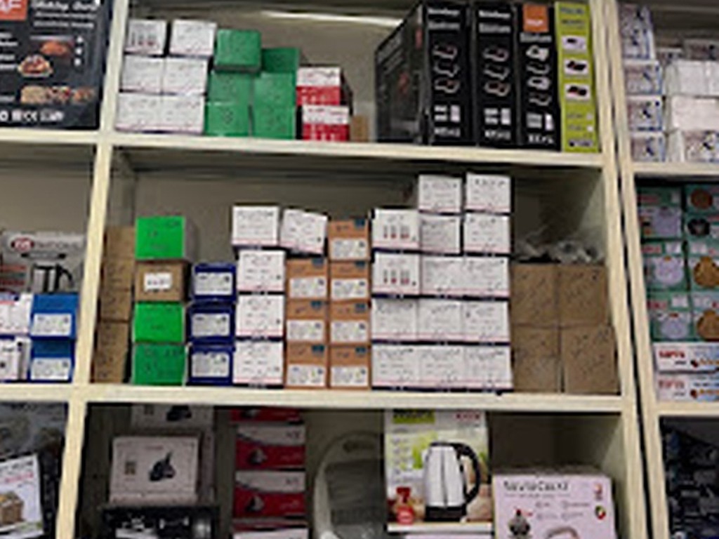 Electric kettles and home appliances on the shelf