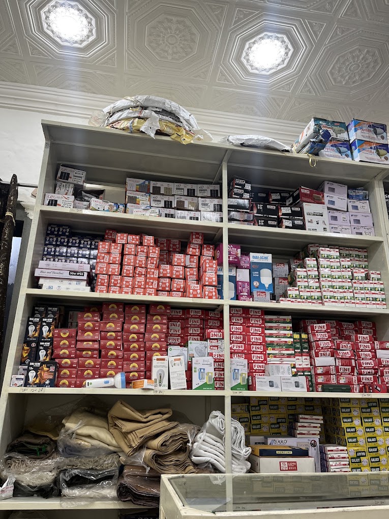 Bulbs and energy savers stacked on the shelf